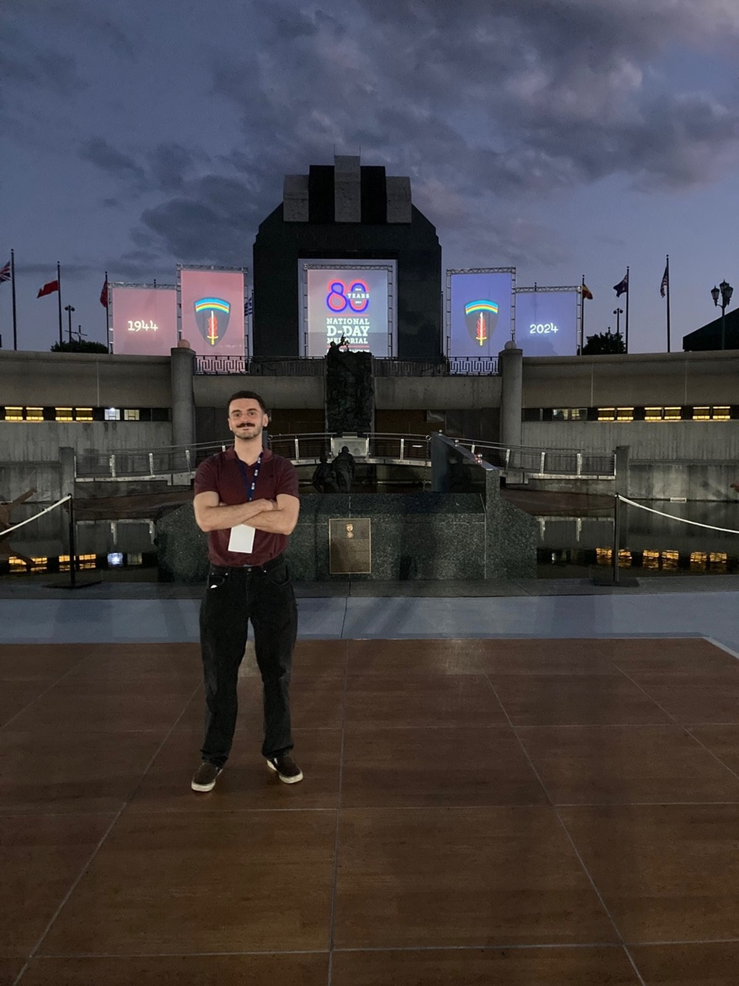 Carter Roberts standing in front of the National D-Day Memorial.