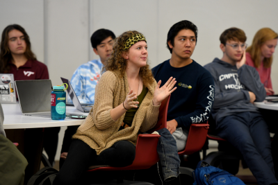 A student asks a question in an urban planning class