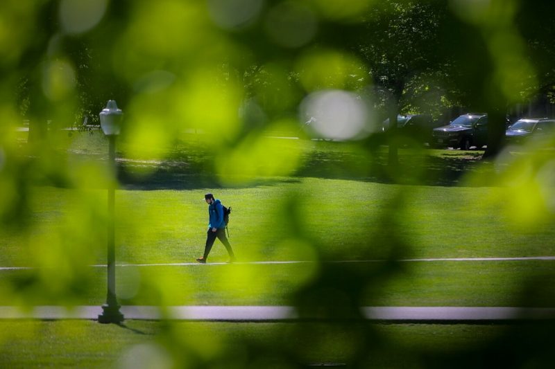 A student walks on campus